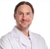 Dr. Dr. med. Bastian Dislich, Oberarzt 
